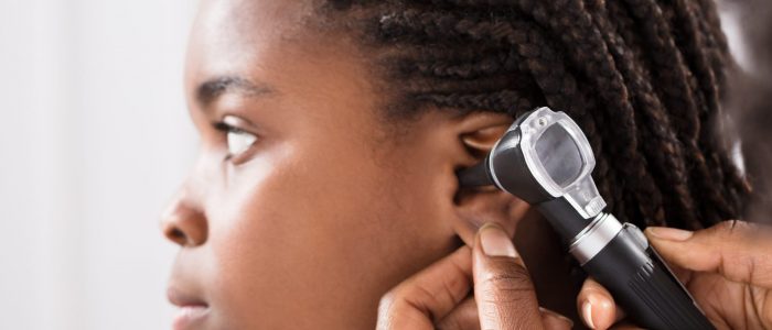 Doctor,Using,Otoscope,Instrument,To,Check,Girl's,Ear,In,Hospital Center for Refugee and Immigrant Health